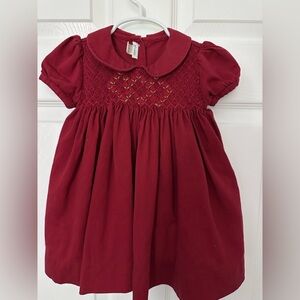 Charming Red Smocked Kids Dress. Perfect for the holidays